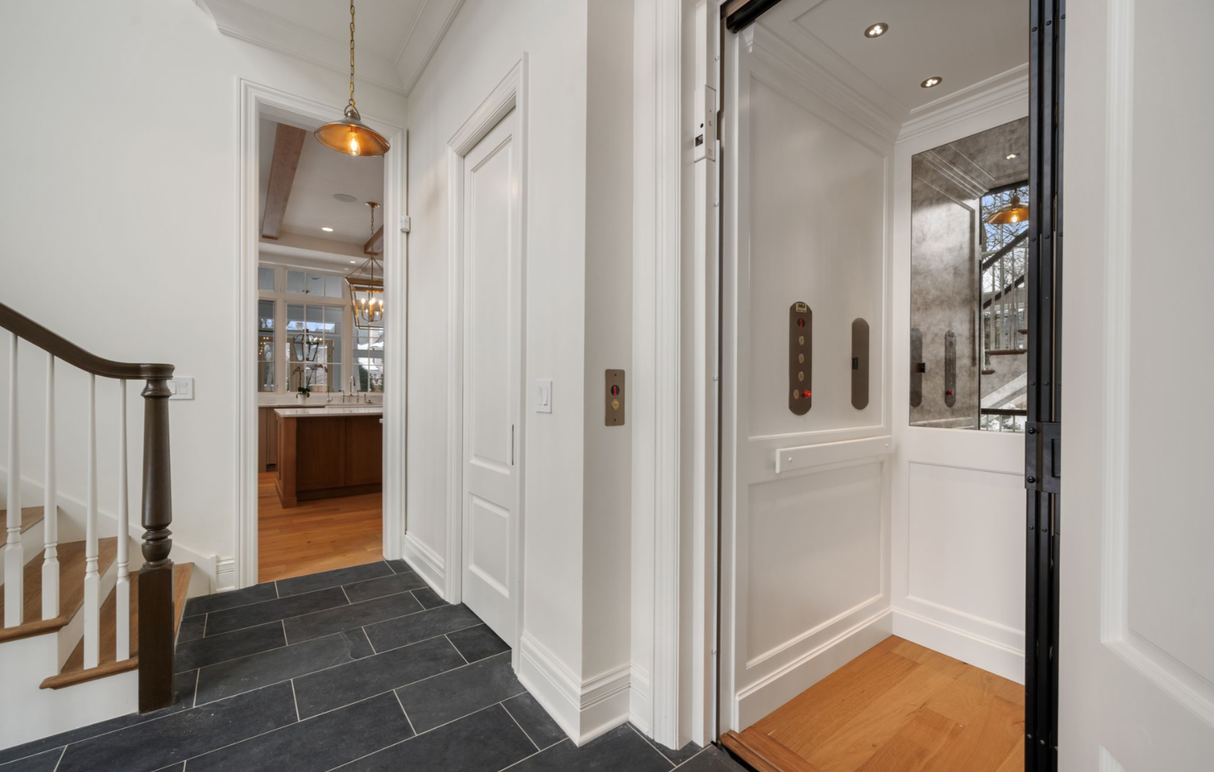 A home elevator with a white interior