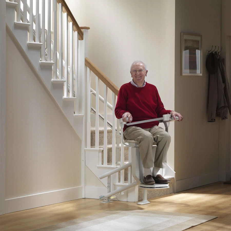 man sitting in Stannah Sienna 260