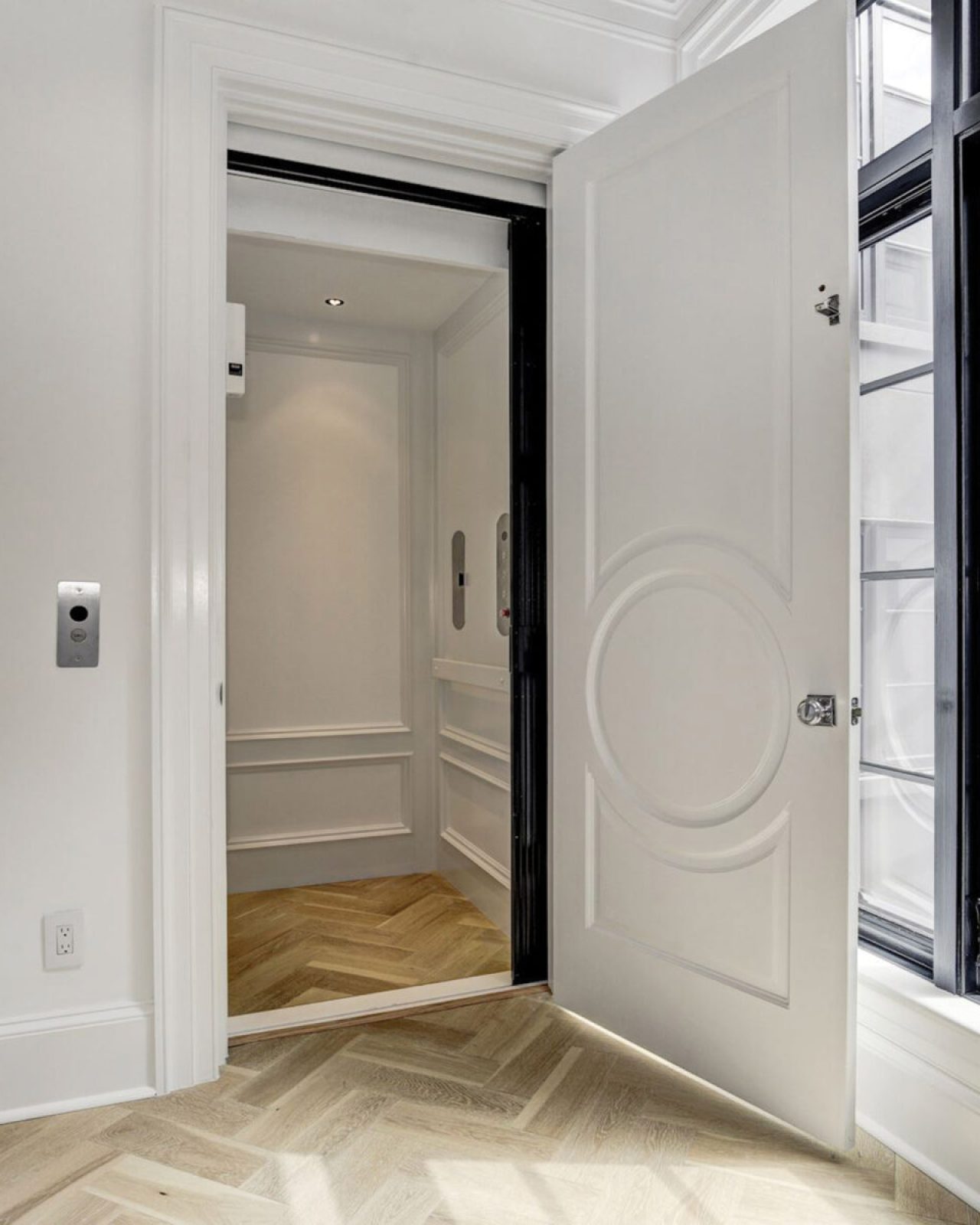 Home elevator with a white interior